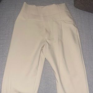 Super cute high waisted pants from Zara. Super comfortable too. Size medium.